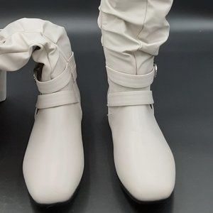 Thigh High White Boots with Side Zipper and Silver Hardware in a Size 8W